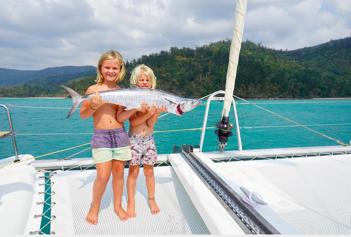 Fishing kids Whitsundays bareboat 